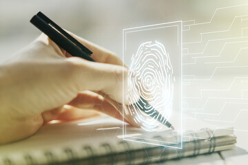 Leinwandbilder - Abstract creative fingerprint concept with woman hand writing in notebook on background. Multiexposure
