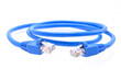 © suradech - blue LAN cable that is coiled in a circle on white background closeup