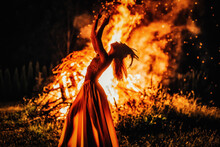 Beautiful Shamanic Woman Dancing By The Fire.