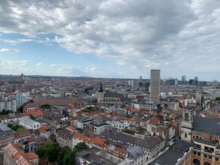 Aerial view of city centre and old town of Brussels. Old buildings rooftops and skyscrapers in the background. Bruxelles, Brussels Capital Region, Belgium.