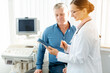© Kzenon - Doctor woman explaining patient test results after examination in her office