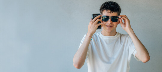 portrait of teen boy with sunglasses