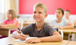 © JackF - Small american school boy sitting at the desk in classroom at lesson in primary school