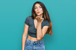 © Krakenimages.com - Young beautiful teen girl wearing casual crop top t shirt looking at the camera blowing a kiss with hand on air being lovely and sexy. love expression.