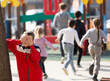 © JackF - Portrait of preschool boy playing hide-and-seek with friends, covering his eyes with hands near big tree