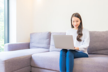 Wall Mural - Portrait beautiful young asian woman use laptop for working