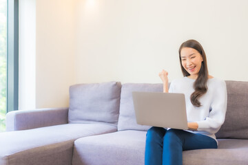 Wall Mural - Portrait beautiful young asian woman use laptop for working