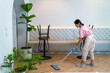 © CandyRetriever  - Young Asian woman coffee shop barista cleaning cafe before opening. Female waitress preparing bistro restaurant for service to customer. Small business owner and part time job working employee concept