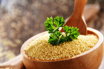 Wall Mural - Composition with uncooked couscous