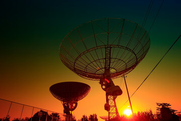 Wall Mural - the silhouette of a radio telescope observatory