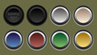 © Slideshowville - Set of round buttons in different colors. Isolated monochromatic background.  Vector illustration.