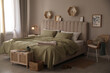 © New Africa - Large comfortable bed with beautiful linens in room