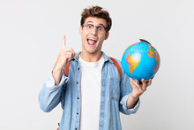 Young Handsome Man Feeling Like A Happy And Excited Genius After Realizing An Idea. Student Holding A World Globe Map