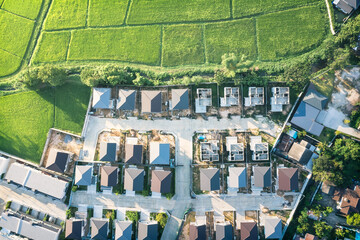 Wall Mural - land or landscape of green field in aerial view. include agriculture farm, house building, village. 