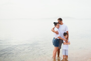 Cute happy family having fun on luxury tropical resort, mother with child, summer holidays, love concept