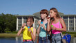 © TommyStockProject - Happy preteen girls blowing soap bubbles in park on summer day.