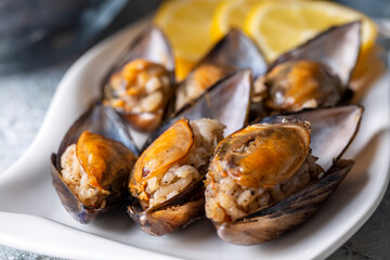 Wall Mural - Turkish Street Food Stuffed Mussels with Lemon - Midye Dolma