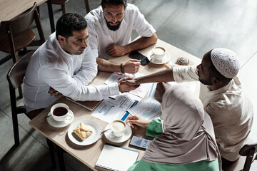 Aufkleber - Two confident businessmen handshaking after making business deal at meeting