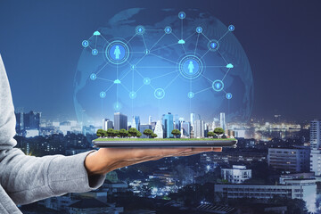Poster - Close up of businesswoman hands holding tablet with abstract glowing connections globe on night city background.