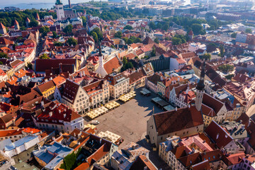 Wall Mural - medieval tallinn, aerial view on the bright roofs of the old city with a drone, the main square of t