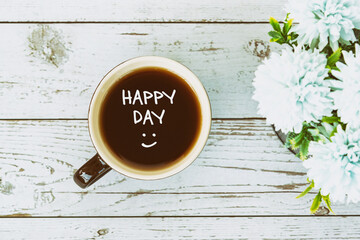 Happy Day with smiling icon with cup of coffee