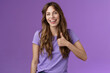 Cheerful supportive lively outgoing caucasian girl like your idea positive opinion give approval show thumbs up satisfied smiling broadly accepting great plan stand purple background