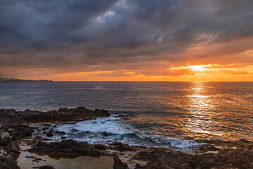 Wall Mural - sea sunset at stones beach