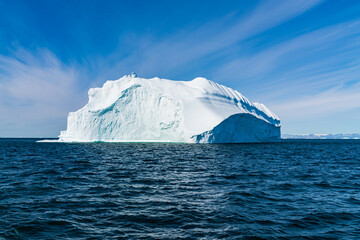 Wall Mural - climate change - iceberg and ice from glacier in arctic nature on greenland