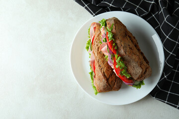 Plate with tasty ciabatta sandwiches, top view