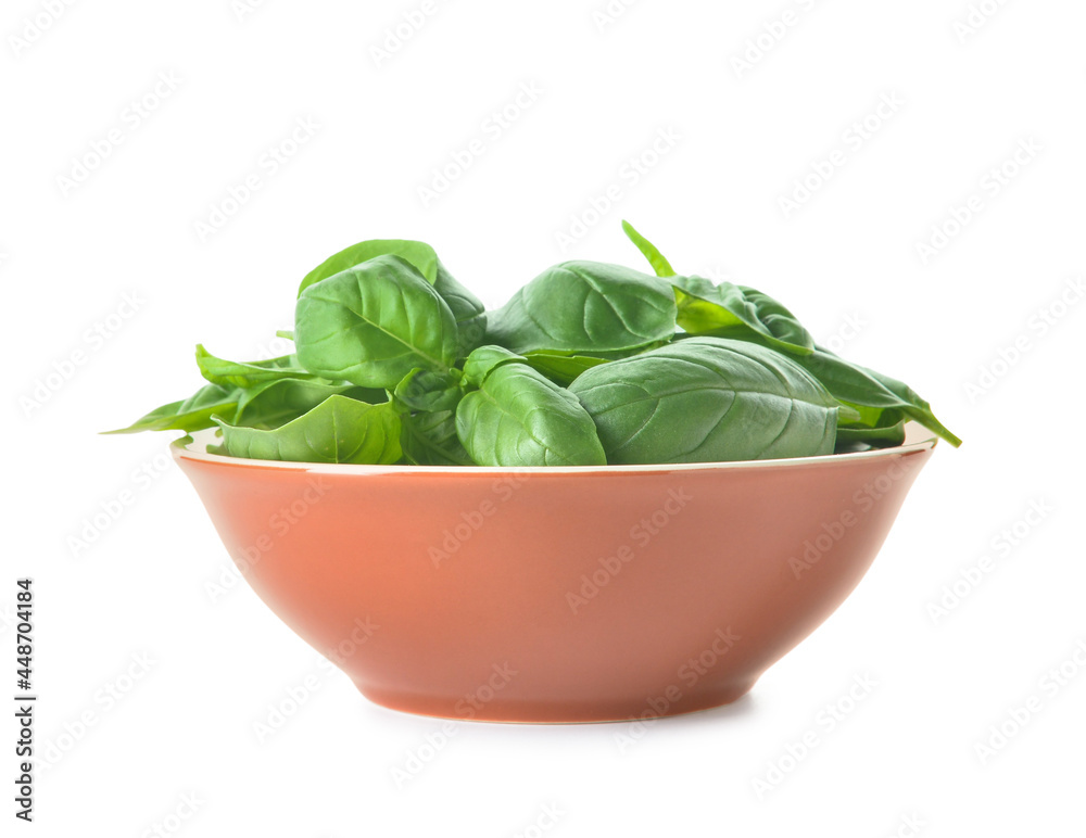 Bowl with fresh basil leaves on white background