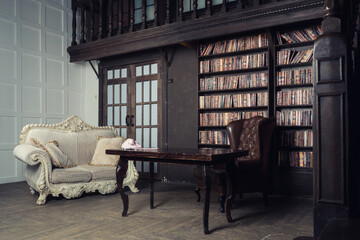 Wall Mural - Classical library room with leather armchair, wooden table and bookcase.