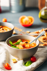 Wall Mural - Tomato soup. Tomato creme with basil and bread.  Bowl with italian tomato soup. 