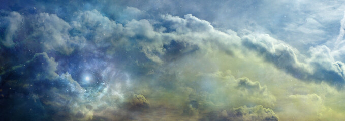 Wall Mural - Beautiful Romantic Atmospheric Evening Cloudscape - Ultramarine blue and yellow ochre coloured clouds and sky with a nebula with a spiritual ethereal feel and copy space
