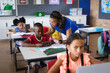 © WavebreakMediaMicro - African american female teacher teaching a boy to use digital tablet in class at elementary school