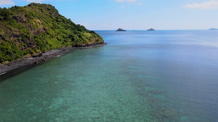 Wall Mural - Drone Aerial view of Mayotte turquoise lagoon, white beach and navigating boats