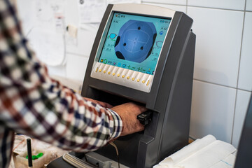 Canvas Print - Production of lenses for spectacles for vision in optics on modern equipment