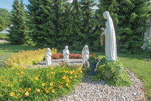 Shrine, The Basilica Of The Virgin Mary In Chelm In Eastern Poland Near Lublin. Rosarium Or Rosary Garden With Statues Of The Mother Of God