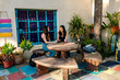 © Erin Brant/Stocksy - Friends together in colorful outdoor setting