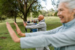 © McKinsey Jordan/Stocksy - Seniors Smile While Practicing Martial Arts in the Park