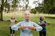 © McKinsey Jordan/Stocksy - Empowered Women Practice Yoga in the Park