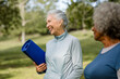 © McKinsey Jordan/Stocksy - Senior Woman Smiles With Friends After Yoga Class