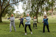 © McKinsey Jordan/Stocksy - Group of Seniors Enjoy a Yoga Workout in the Park