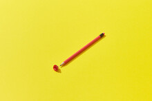 One Pencil On Yellow Background