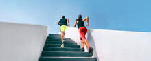 Couple Fitness Workout Two Athletes Running Up Stairs Sprinting Uphill Working Out Dynamic Exercise Panoramic Runners Training Hiit Workout Banner. 