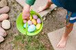 © Erin Brant/Stocksy - Easter eggs in a basket
