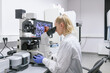 © Hernandez & Sorokina/Stocksy - Woman Looking At Microscope