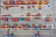 © Demetr White/Stocksy - many freight containers in the port