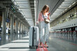 © ZHPH Production/Stocksy - Woman at the airport