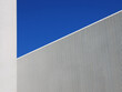 © Rene de Haan/Stocksy - white wall, blue sky