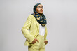 © Javier Díez/Stocksy - Elegant muslim  female model in stylish suit and hijab